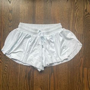 Trendy short/skirt, goes with everything and never worn!